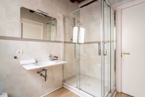 Bathtub, hair dryer, towels