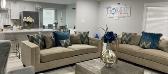 Modern 4 bedroom home with pool.  Sleeps 10-12 comfortable.