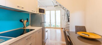 Seaside villas in a small complex surrounded by greenery by the sea