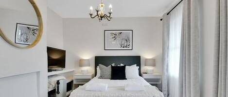 2 dormitorios, tabla de planchar con plancha, cuna de viaje y wifi