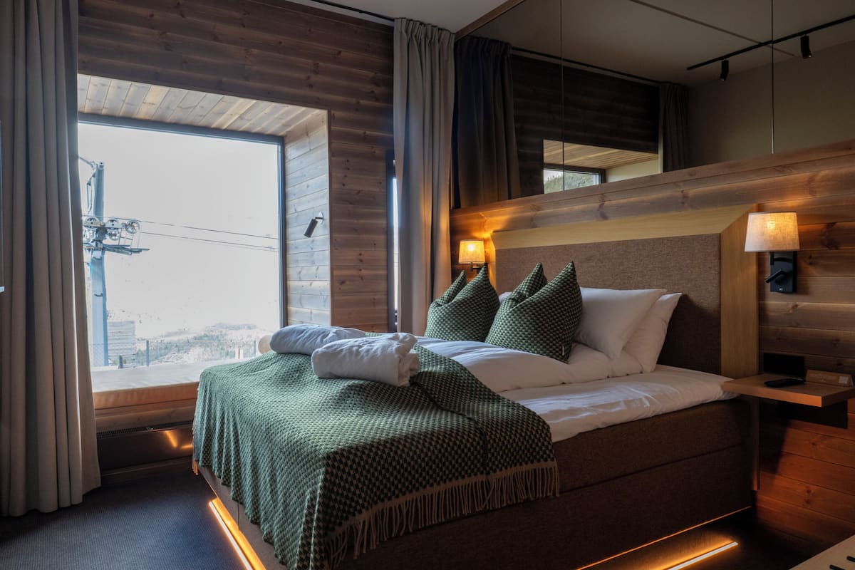 Habitación Deluxe (Petite) | Minibar, escritorio, espacio para trabajar con un portátil