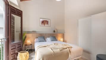 Estudio | Ropa de cama de alta calidad, edredón y tabla de planchar con plancha