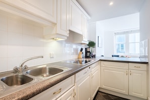 Microwave, oven, stovetop, coffee/tea maker