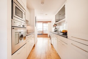 スーペリア アパートメント | 専用キッチン | 電子レンジ、オーブン、コンロ、食器洗い機