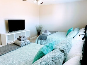 3 bedrooms, desk, iron/ironing board, travel cot