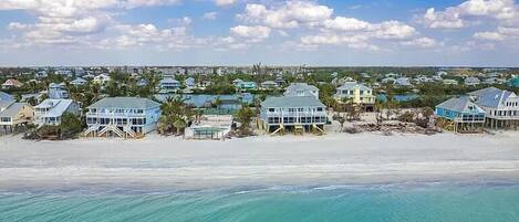 On the beach, sun loungers, beach towels