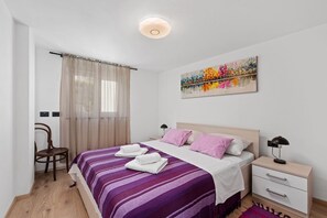 2 bedrooms, in-room safe, iron/ironing board, cots/infant beds