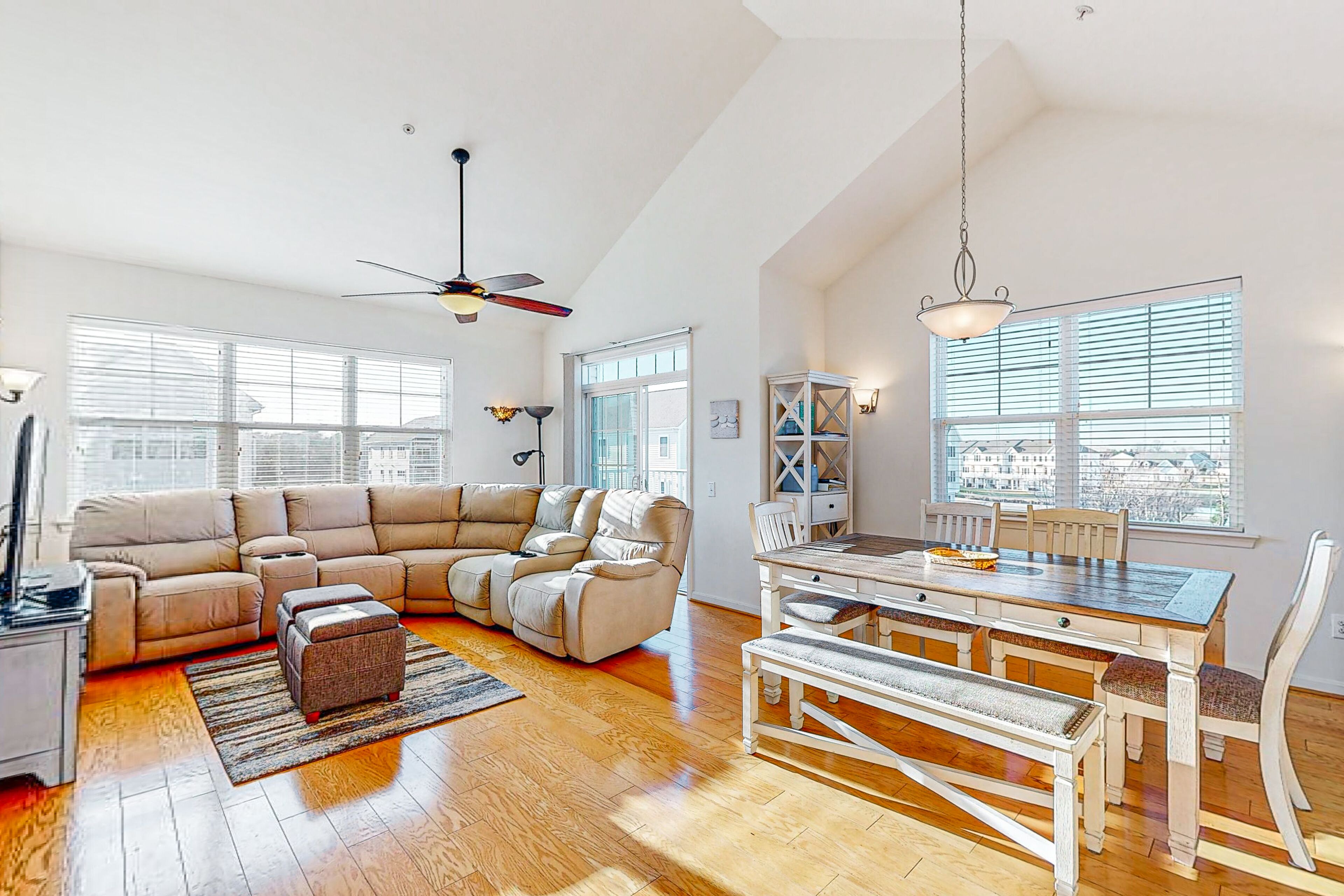 Top-floor dog-friendly luxury condo with private W/D, central AC, & pool access