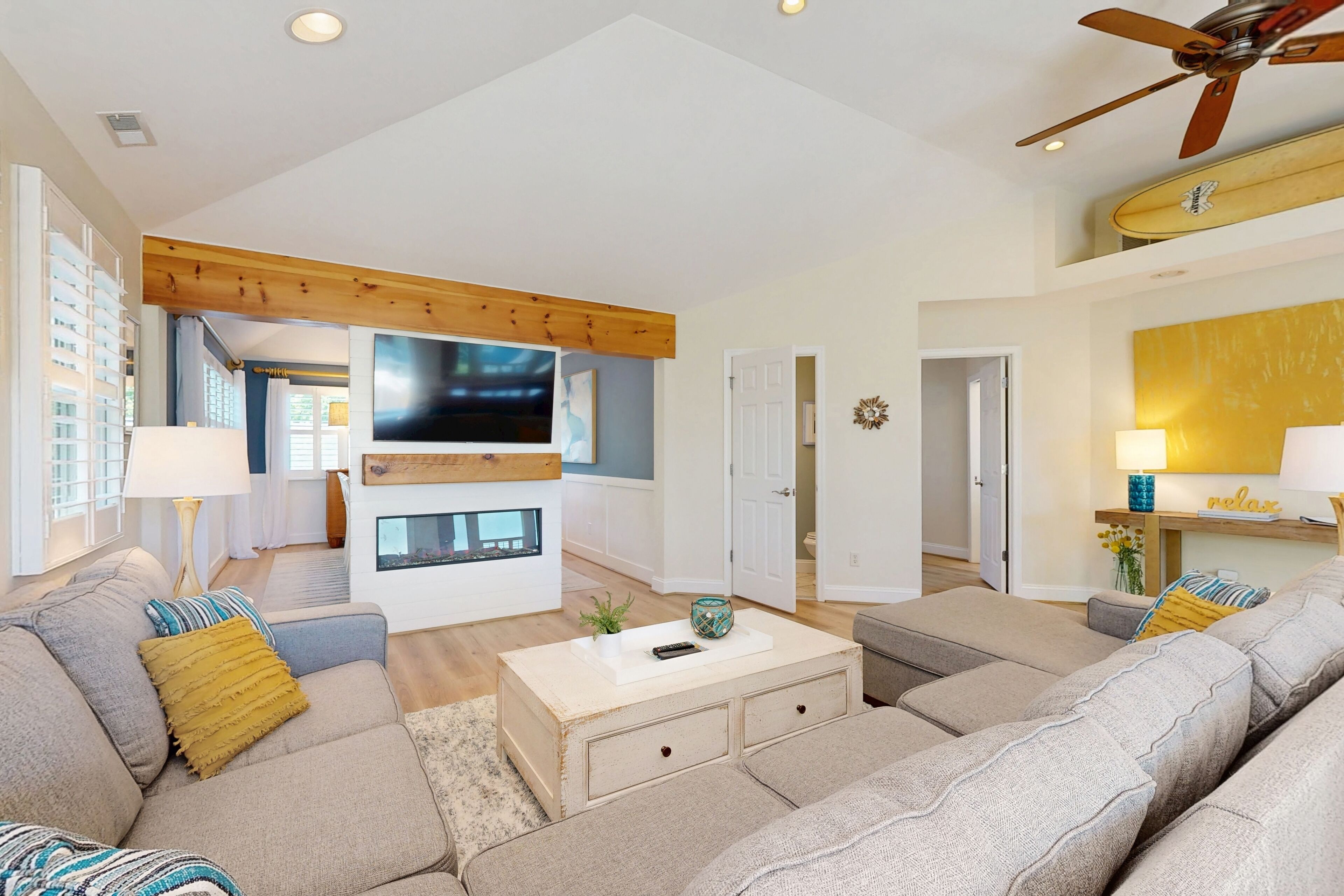 TV, fireplace, books