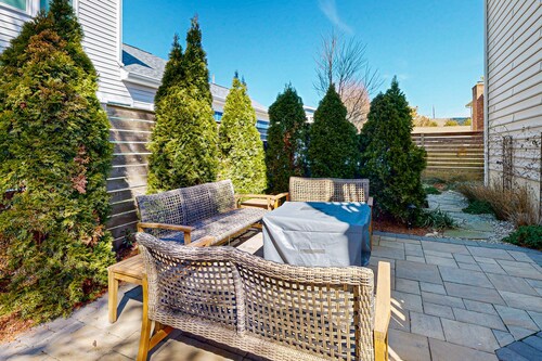 Dog-friendly home 3.5 blocks to beach w/private hot tub, balconies, firepit, AC