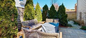 Dog-friendly home 3.5 blocks to beach w/private hot tub, balconies, firepit, AC