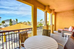Outdoor dining - Heated Waterfront Pool and Fishing Dock! Steps to the Beach, Grill, and Grocery Next Door (Treasure Island)