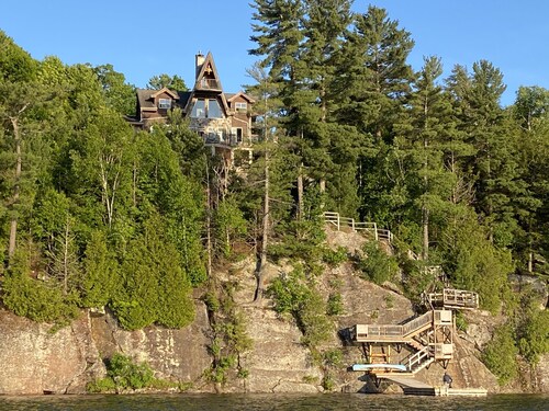 Breathtaking views from rustic cottage atop the Edge of Kennisis Lakes!