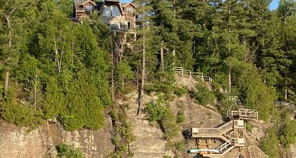 Breathtaking views from rustic cottage atop the Edge of Kennisis Lakes!