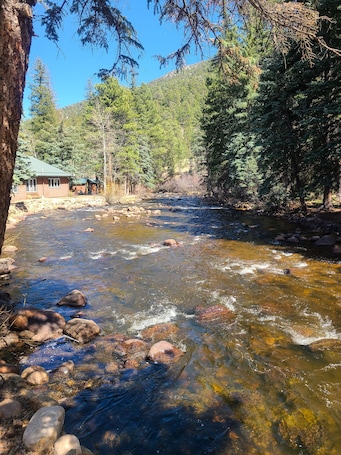 Property grounds. Original RMNP Riverfront Cabin on the Thompson River