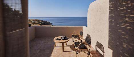 Kamar Double Deluks, pemandangan laut | Teras/patio