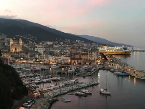 A coastal town with a marina, a prominent church, and a ferry dock. - Villa Avec Piscine en Plein Coeur de Bastia (Bastia)