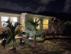 Guests can enjoy a peaceful retreat surrounded by lush tropical foliage and a serene atmosphere.