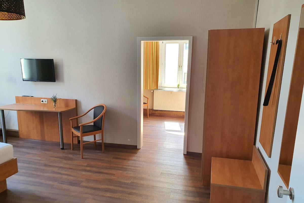 Desk, laptop workspace, free WiFi, bed sheets