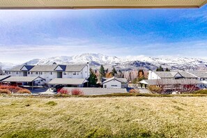 Set amidst snow-capped mountains, this residential area offers a serene view of the surrounding landscape.