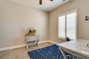 Sit comfortably at the desk with a chair and enjoy the view from the large window.