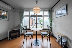 Basic Condo | Living area | Flat-screen TV