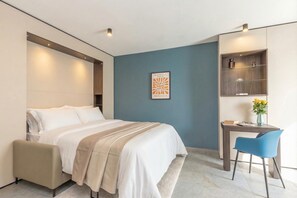 Laptop workspace, iron/ironing board, free WiFi, bed sheets