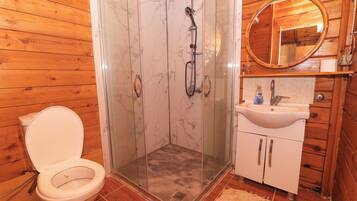Deluxe Bungalow, 1 Bedroom, Non Smoking, Sea View | Bathroom | Shower, bathrobes, towels
