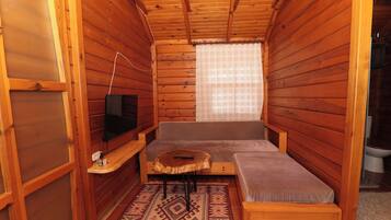 Family Bungalow | Living area | 42-inch TV with satellite channels