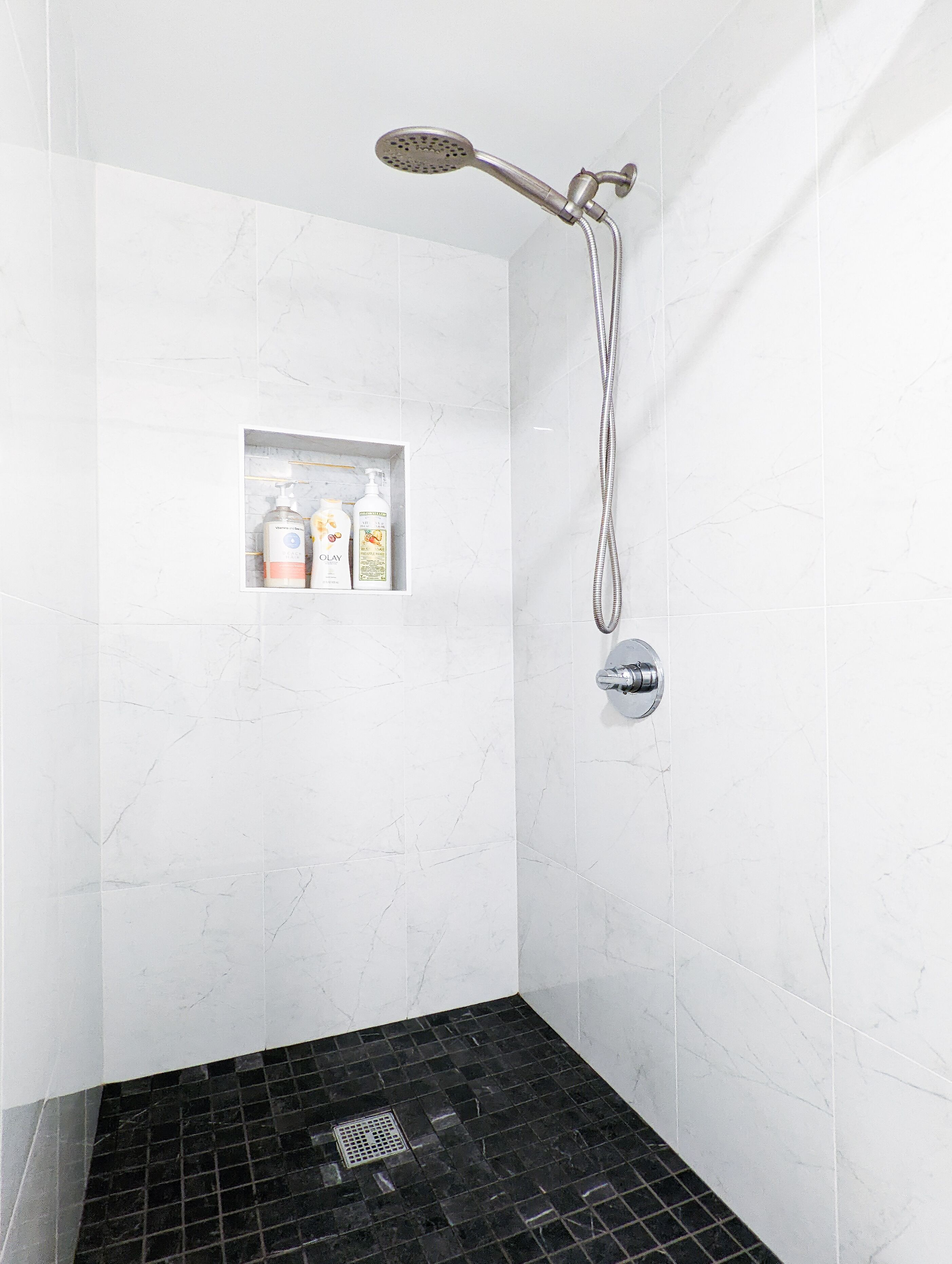 Bathtub, hair dryer, towels, soap