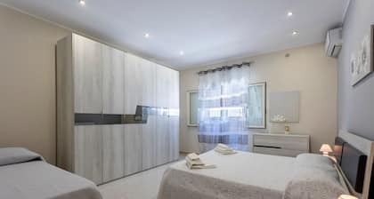 Maison "Bandiera Blu", proche plage, avec climatisation, terrasse et jardin.