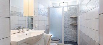 Casa de vacaciones 'Bandiera Blu' cerca de la playa con aire acondicionado, terraza y jardín