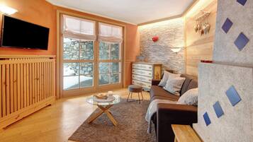 Televisio, takka, DVD-soitin, suoratoistopalvelut