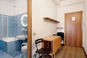 Bathtub, hair dryer, towels