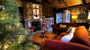 Smart TV, fireplace, books, printers