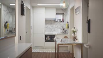 Fridge, microwave, highchair, cookware/dishes/utensils