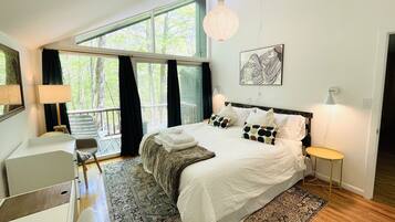 1 bedroom, desk, iron/ironing board, travel crib
