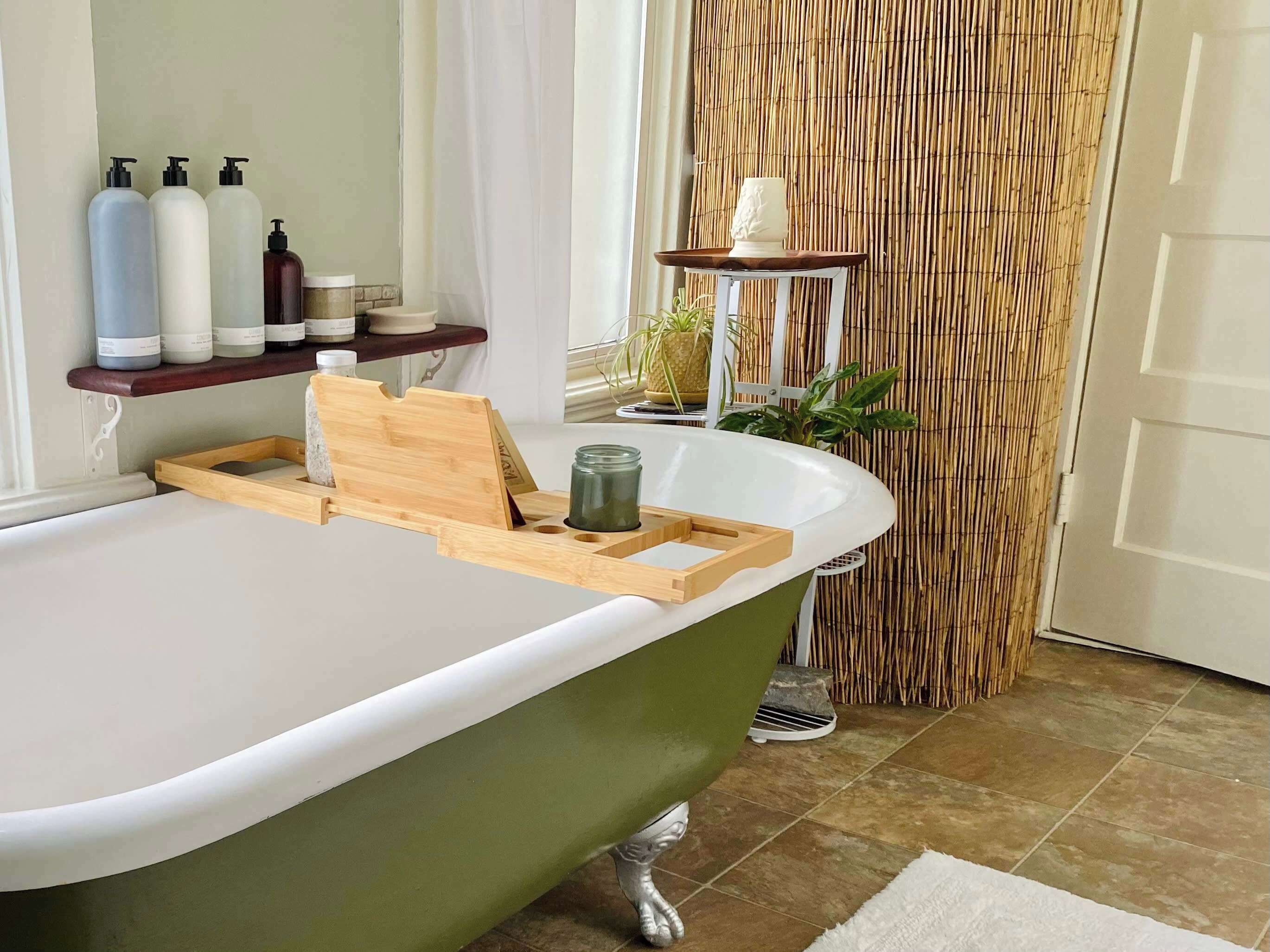 Bathtub, hair dryer, towels, shampoo