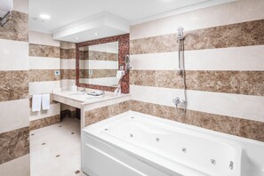 Shower, rainfall showerhead, designer toiletries, hair dryer