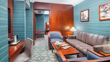 Suite, 2 Bedrooms, City View | Living area | 46-inch flat-screen TV with cable channels