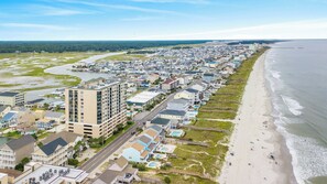 A coastal residential area with a beachfront, a large hotel, and a marina. - Beach Walk Villas 908 -2BR-Cherry Grove-I/O Pools (North Myrtle Beach)