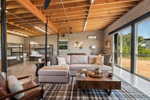 TV, table football, offices - Luxury Riverfront Retreat | 6 Cabins | Private Pool (Llano)