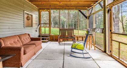 Riverfront home with private dock, kayaks, views, firepit, cornhole & foosball