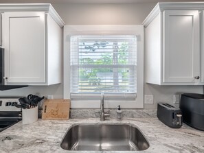 Fridge, microwave, oven, stovetop - Spacious w/ all King Beds, 15 min from Beach + Downtown, Pup Friendly! (Wilmington)