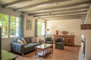 Smart TV, DVD player, table football, books