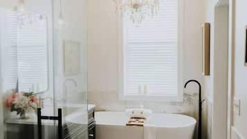 Bathtub, hair dryer, towels