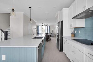 Fridge, microwave, oven, stovetop - Luxury Beach Townhome | Team Joseph Ellen (Jacksonville Beach)
