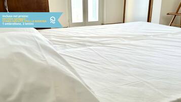 2 habitaciones y ropa de cama