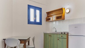 Standard Apartment, Sea View | Private kitchen | Full-size fridge, cookware/dishes/utensils, kitchen island - Veneto Sea View Apartments (Hersonissos)
