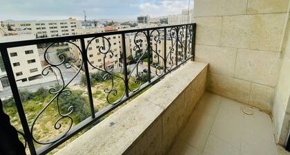 luxury apartments in Amman central with a view of the city skyline